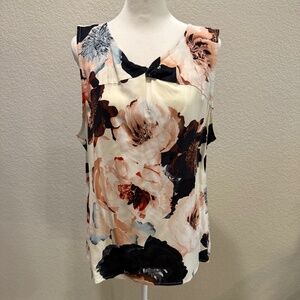 Sleeveless twisted front floral blouse